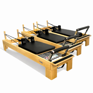 Equipamiento completo para estudio de Pilates con reformers, silla, trapecio y ladder barrel.